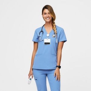 FIGS Casma three pocket scrub top, ceil blue, size small
